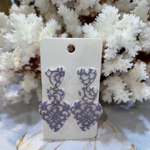 Purple and white clay earrings for all occasions